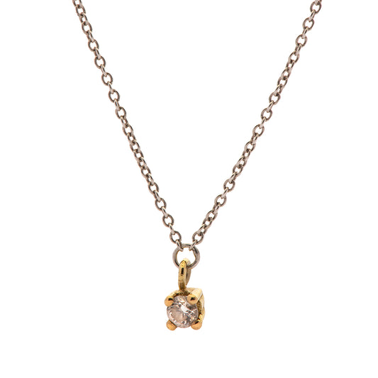 Colgante plata y brillante con oro
